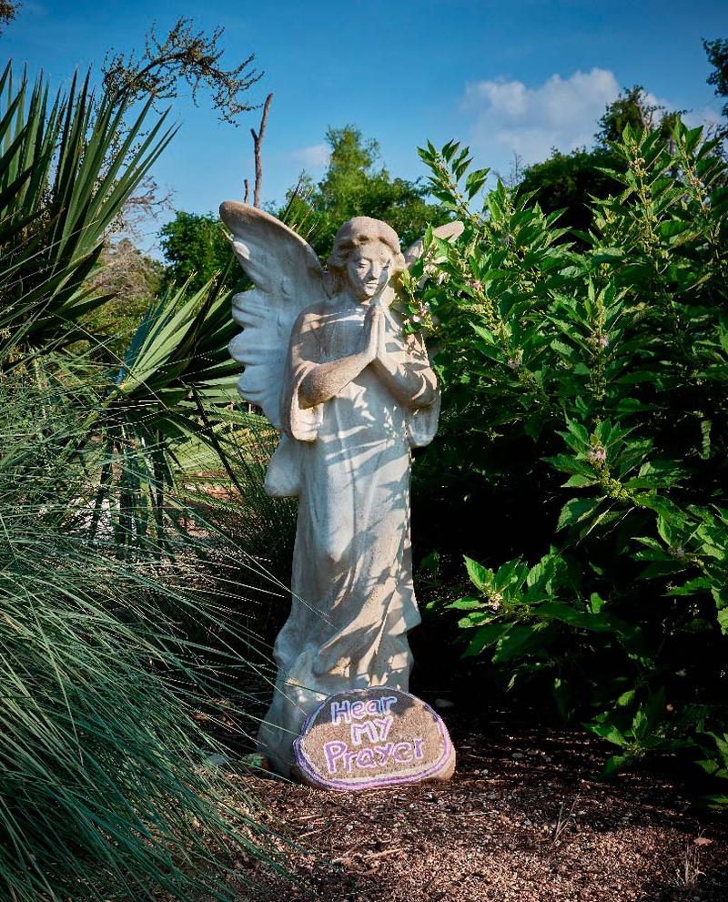 A garden angel along the walking trails - offers quiet spaces for contemplation for the best spiritual retreats.