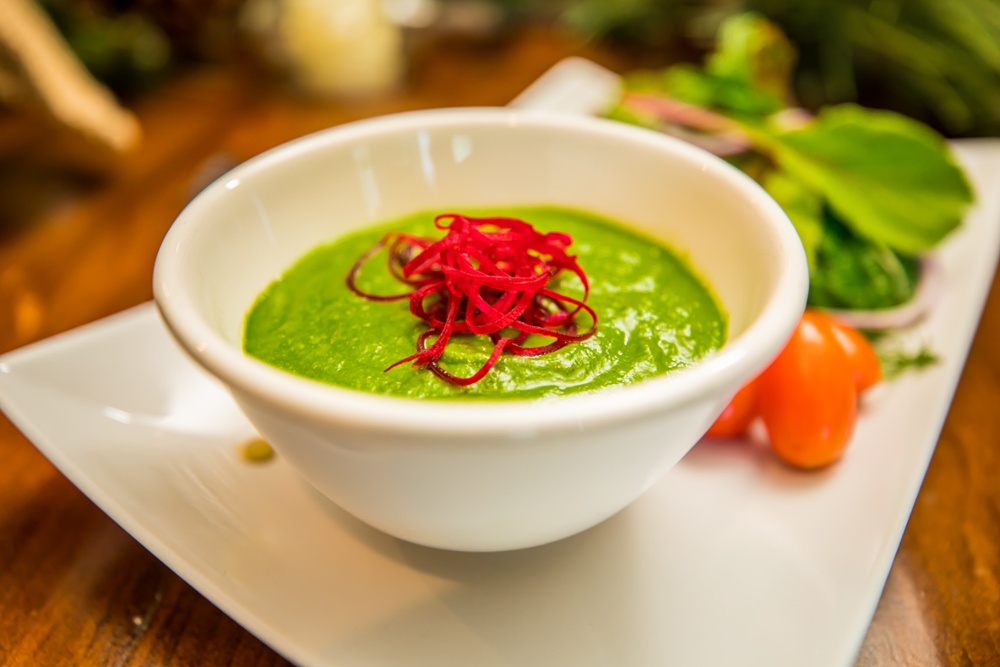 A bowl of healthy, vegetable soup to reset your physical health at OHI’s wellness retreat in Southern California.